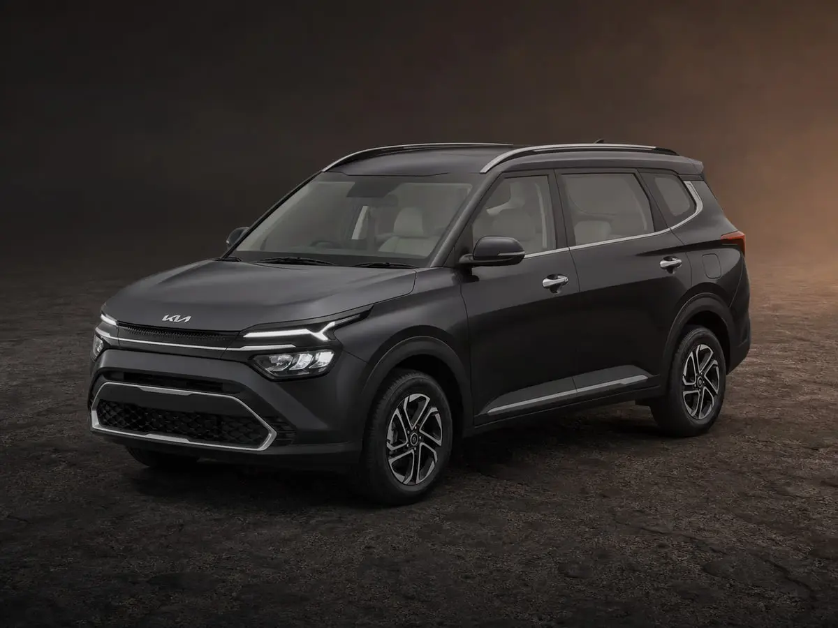 Kia Carens — Studio (dark)