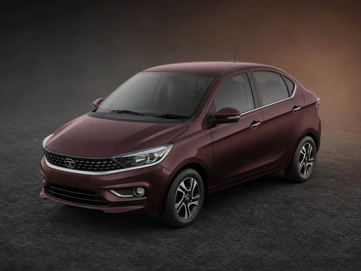 Tata Tigor — Studio (dark)
